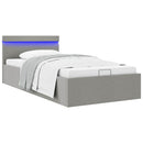 hydraulisk opbevaringsseng med LED 100x200 cm stof lysegrå