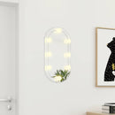 spejl med LED-lamper 60x30 cm oval glas