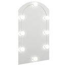 spejl med LED-lamper 70x40 cm buet glas