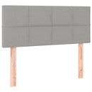 sengegavl med LED-lys 100x5x78/88 cm stof lysegrå