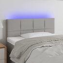 sengegavl med LED-lys 100x5x78/88 cm stof lysegrå