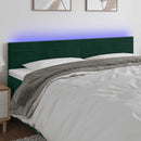 sengegavl med LED-lys 160x5x78/88 cm fløjl mørkegrøn