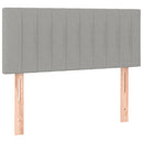 sengegavl med LED-lys 100x5x78/88 cm stof lysegrå