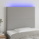 sengegavl med LED-lys 100x5x118/128 cm stof lysegrå
