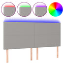 sengegavl med LED-lys 160x5x118/128 cm stof lysegrå