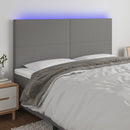 sengegavl med LED-lys 180x5x118/128 cm stof mørkegrå