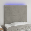 sengegavl med LED-lys 100x5x118/128 cm fløjl lysegrå