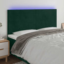 sengegavl med LED-lys 180x5x118/128 cm fløjl mørkegrøn
