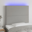 sengegavl med LED-lys 90x5x118/128 cm stof lysegrå