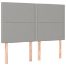 sengegavl med LED-lys 144x5x118/128 cm stof lysegrå