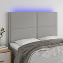 sengegavl med LED-lys 144x5x118/128 cm stof lysegrå