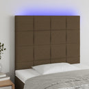 sengegavl med LED-lys 90x5x118/128 cm stof mørkebrun