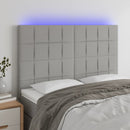 sengegavl med LED-lys 144x5x118/128 cm stof lysegrå