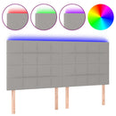 sengegavl med LED-lys 160x5x118/128 cm stof lysegrå