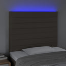 sengegavl med LED-lys 90x5x118/128 cm stof gråbrun