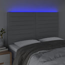 sengegavl med LED-lys 144x5x118/128 cm stof lysegrå