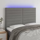 sengegavl med LED-lys 144x5x118/128 cm stof mørkegrå