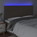 sengegavl med LED-lys 180x5x118/128 cm stof gråbrun