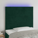 sengegavl med LED-lys 80x5x118/128 cm fløjl mørkegrøn