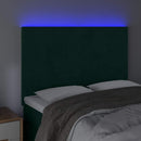 sengegavl med LED-lys 144x5x118/128 cm fløjl mørkegrøn