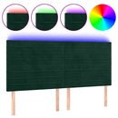sengegavl med LED-lys 180x5x118/128 cm fløjl mørkegrøn