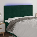 sengegavl med LED-lys 200x5x118/128 cm fløjl mørkegrøn