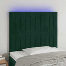 sengegavl med LED-lys 80x5x118/128 cm fløjl mørkegrøn