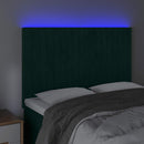 sengegavl med LED-lys 144x5x118/128 cm fløjl mørkegrøn