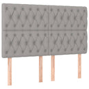 sengegavl med LED-lys 144x7x118/128 cm stof lysegrå