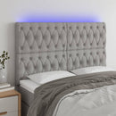 sengegavl med LED-lys 160x7x118/128 cm stof lysegrå