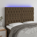 sengegavl med LED-lys 160x7x118/128 cm stof mørkebrun