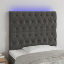 sengegavl med LED-lys 90x7x118/128 cm fløjl mørkegrå