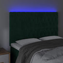 sengegavl med LED-lys 144x7x118/128 cm fløjl mørkegrøn