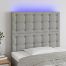 sengegavl med LED-lys 80x5x118/128 cm stof lysegrå
