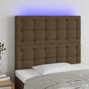 sengegavl med LED-lys 100x5x118/128 cm stof mørkebrun