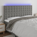 sengegavl med LED-lys 160x5x118/128 cm stof mørkegrå