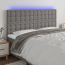 sengegavl med LED-lys 180x5x118/128 cm stof mørkegrå