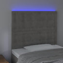 sengegavl med LED-lys 80x5x118/128 cm fløjl lysegrå
