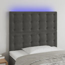 sengegavl med LED-lys 90x5x118/128 cm fløjl mørkegrå
