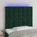 sengegavl med LED-lys 100x5x118/128 cm fløjl mørkegrøn
