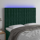 sengegavl med LED-lys 144x5x118/128 cm fløjl mørkegrøn