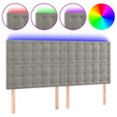 sengegavl med LED-lys 160x5x118/128 cm fløjl lysegrå