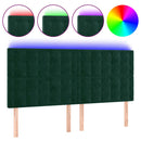 sengegavl med LED-lys 200x5x118/128 cm fløjl mørkegrøn