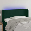 sengegavl med LED-lys 83x16x78/88 cm fløjl Mørkegrøn