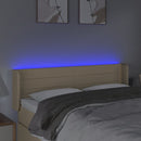 sengegavl med LED-lys 147x16x78/88 cm stof cremefarvet