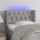 sengegavl med LED-lys 83x16x78/88 cm stof lysegrå