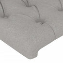 sengegavl med LED-lys 103x16x78/88 cm stof lysegrå