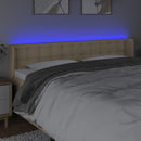 sengegavl med LED-lys 163x16x78/88 cm stof cremefarvet