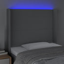 sengegavl med LED-lys 83x16x118/128 cm stof lysegrå