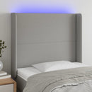 sengegavl med LED-lys 93x16x118/128 cm stof lysegrå